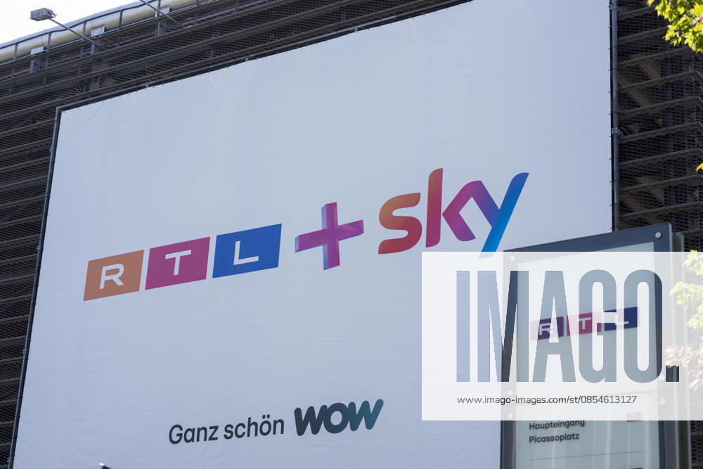 A poster with the slogan RTL Sky ganz schön WOW hangs at the entrance to a parking garage on the grounds of RTL Deutschland Following a competition law review, the EU Commission has approved the takeover of Sky Deutschland by RTL Group RTL Medienunternehmen Firmensitz am Kölner Messeturm The headquarters of TV broadcaster RTL at Pic