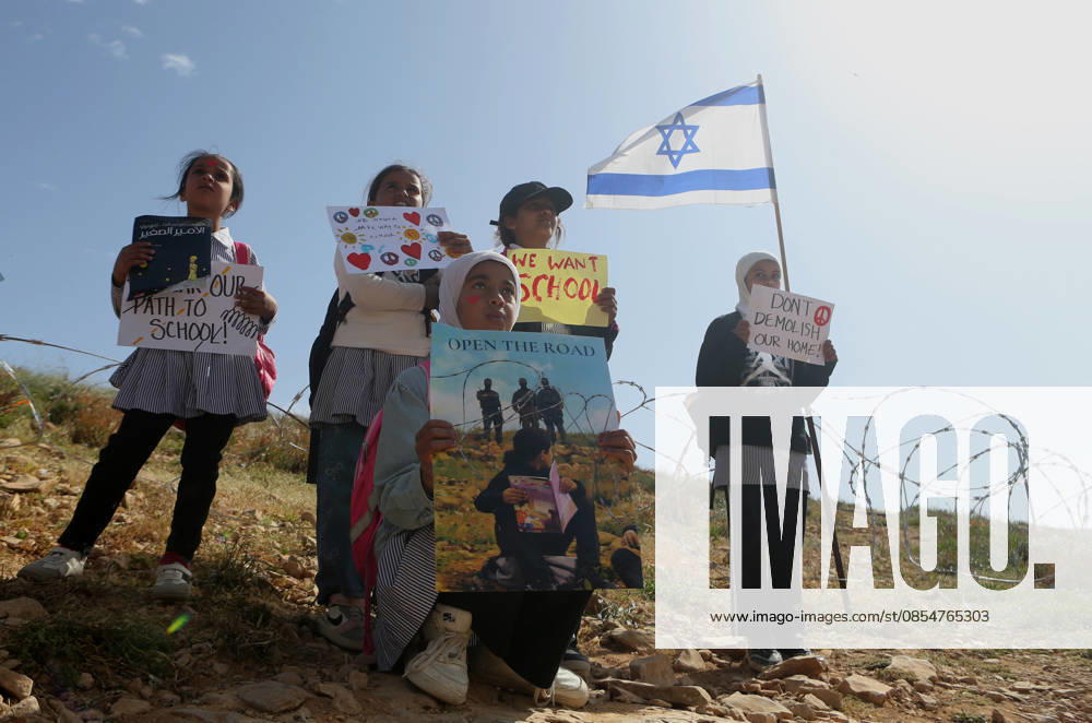 Palestinian students continue their sit-in and study on the side of a road, which has been closed by settlers and Israeli forces, preventing them from reaching their schools, in the village of Umm al-Khair in Masafer Yatta, Palestinian students continue their sit-in and study on the side of a road, which has been closed by settlers and Israeli forces, preventing them from reaching their schools, in the village of Umm al-Khair in Masafer Yatta, near Hebron in the southern West Bank. April 26, 2026 Israeli settlers had closed the shortcut used by students and Palestinian villagers, which passes through the new Jewish settlement outpost of Carmel, following the Gaza war that began in 2023. Photo by Mamoun Wazwaz apaimages Hebron West Bank Pa