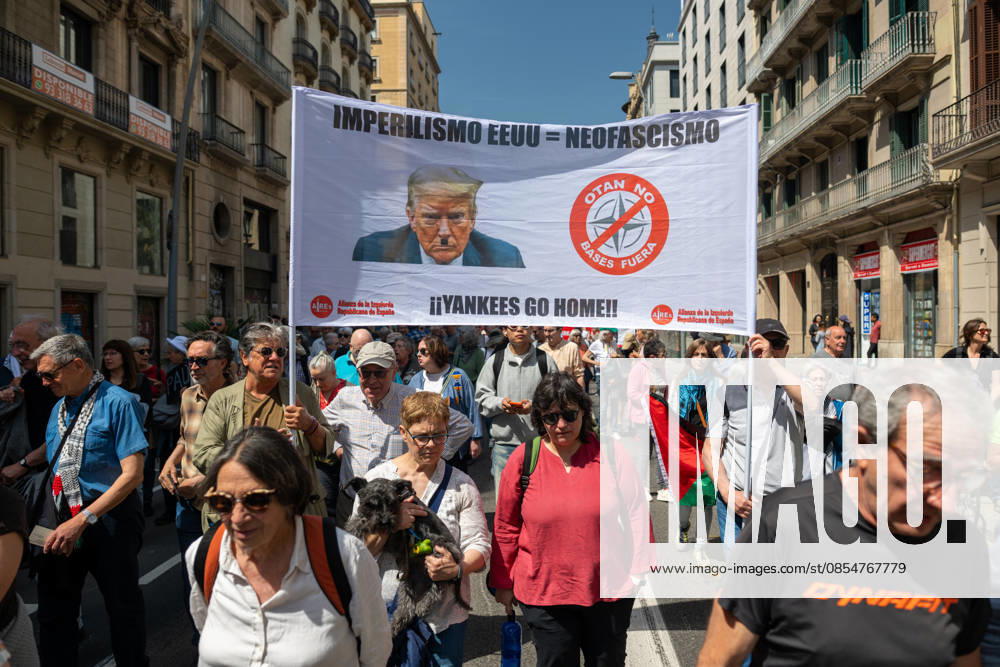 Demonstration in Barcelona Against the war, overthrow the rearmament NATO no Basta de complicidad con Israel People carry banner with slogan Imperialism USA neofascism Yankees go home during the demonstration Against the war, overthrow the rearmament NATO no Basta de complicidad con Israel , on April 26, 2026, in Barcelona, Catalonia Spain The protest is driven by the Campaign against military spending, militarism and militarism and other pacifist, antimilitarist and Palestine solidarity groups The manifesto demands to the Spanish government a total arms embargo on Israel and the breaking of economic, commercial and military relations with that country 26 APRIL 2026 Lorena Sopê Barcelona, Catalunya Barcelona, Catalunya Espana