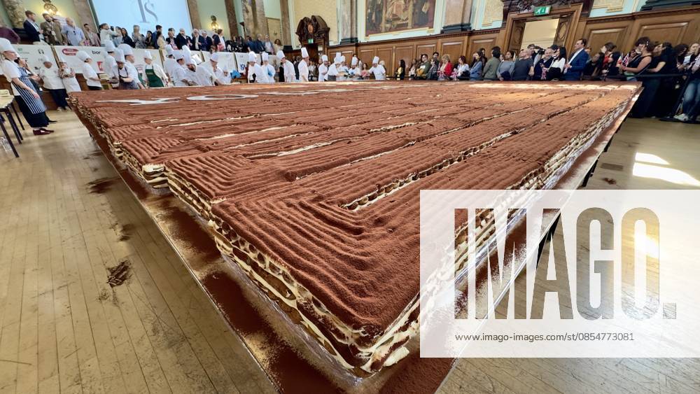 World s longest tiramisu record broken in London LONDON, UNITED KINGDOM - APRIL 26: A record-breaking tiramisu, measuring 440.58 meters, is displayed at Chelsea Old Town Hall in London, United Kingdom on April 26, 2026. Led by Italian entrepreneur Mirko Ricci and the London branch of the Federation of Italian Chefs, dozens of volunteers collaborated over two days to surpass the previous 273.5-meter record set in Milan in 2019. Guinness World Records official adjudicator Lorenzo Veltri verified the measurement on-site during the event, which was supported by the Italian Embassy and the Italian Cultural Institute. All proceeds from the organization were donated to the Esharelife Foundation to support efforts in combating poverty. Muhammed Yay