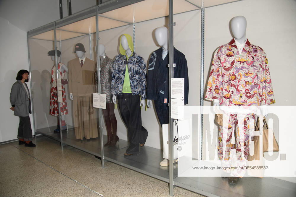 NIGO: From Japan with Love Press Preview at Design Museum, London, UK - A staff member poses with Various looks from Kenzo s collection - Autumn Winter 2022-2025, Spring Summer 2025 at a photocall for The Design Museum s NIGO: From Japan with Love Exhibition at The Design Museum in London, England, UK on Tuesday 28 April 2026 which runs from 1st May 2026 - 4th October 2026., Credit:Justin Ng Avalon UK, England, London, Design Museum