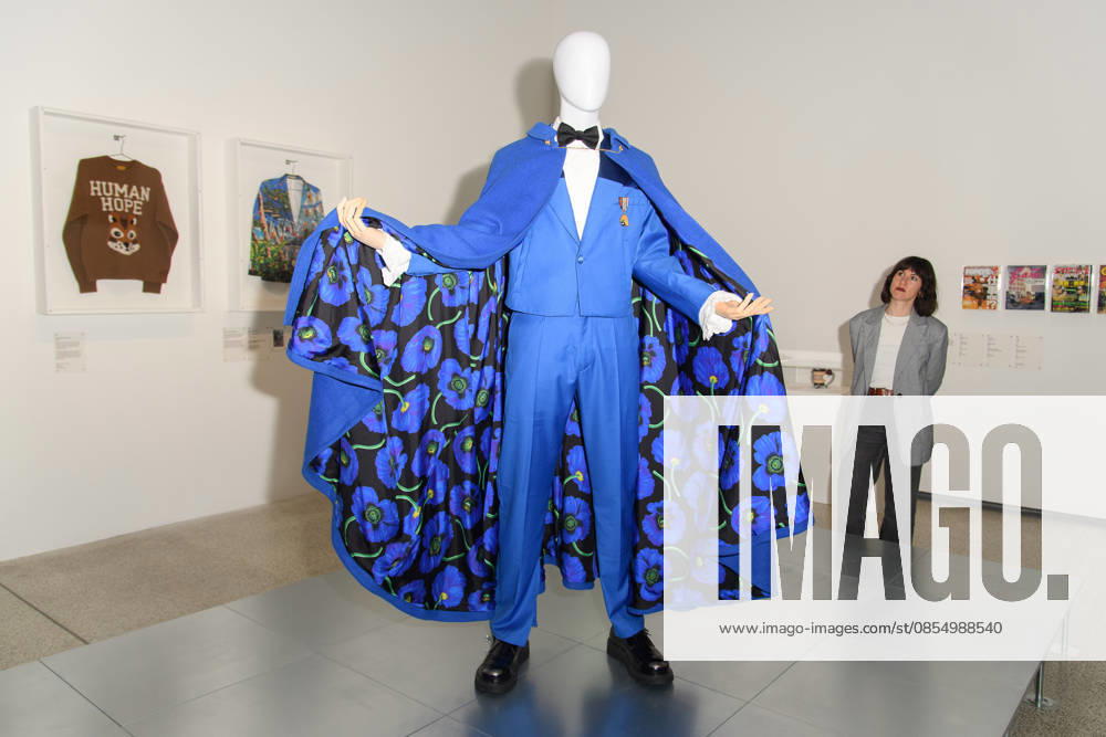 NIGO: From Japan with Love Press Preview at Design Museum, London, UK - A staff member poses with A Cape and suit by Kenzo (2022) worn by Kid Cudi at the 2022 Met Gaa at a photocall for The Design Museum s NIGO: From Japan with Love Exhibition at The Design Museum in London, England, UK on Tuesday 28 April 2026 which runs from 1st May 2026 - 4th October 2026., Credit:Justin Ng Avalon UK, England, London, Design Museum