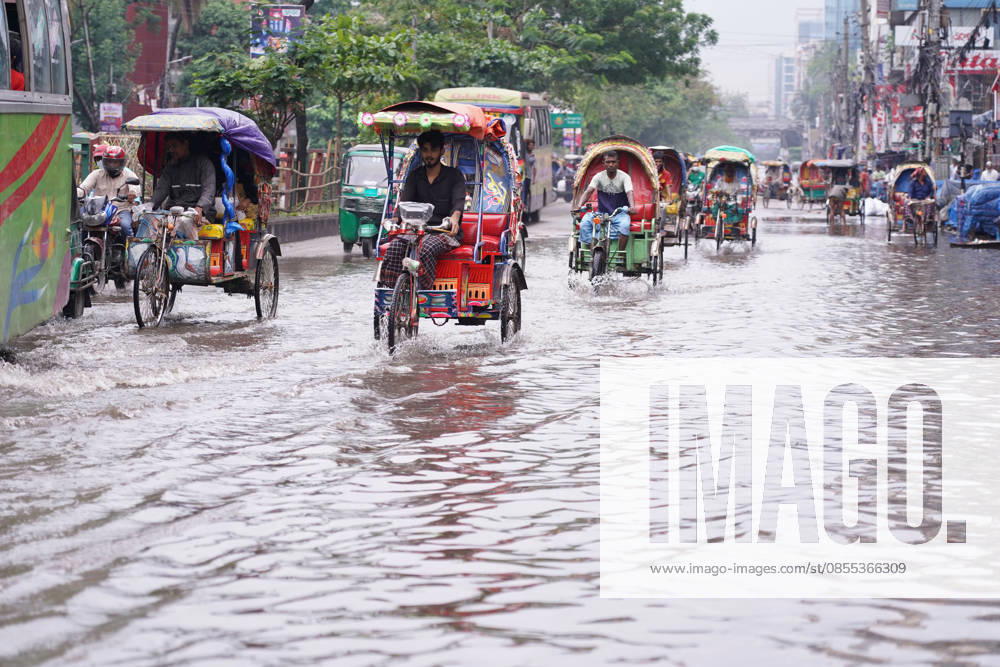 DHAKA, BANGLADESH †May 1, 2026: After several hours of continuous rainfall, many small and major roads across the capital Dhaka were submerged, with water levels ranging from knee-deep to waist-deep in some areas. People forced to leave their homes for work faced severe difficulties, disrupting normal city life. Stray dogs and other animals were also left vulnerable in the flooded conditions. In many cases, clogged manholes filled with plastic waste and debris obstructed drainage systems, leading to widespread waterlogging. Dhaka Bangladesh - ZUMAk185 20260501_zip_k185_047