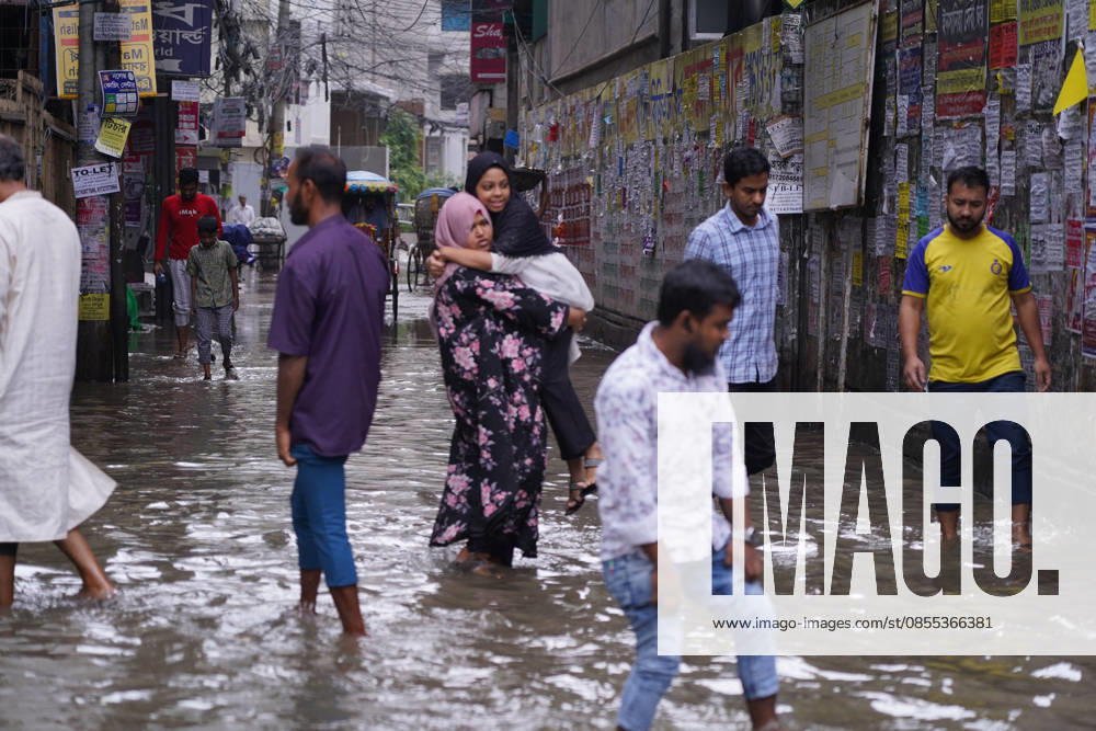 DHAKA, BANGLADESH †May 1, 2026: After several hours of continuous rainfall, many small and major roads across the capital Dhaka were submerged, with water levels ranging from knee-deep to waist-deep in some areas. People forced to leave their homes for work faced severe difficulties, disrupting normal city life. Stray dogs and other animals were also left vulnerable in the flooded conditions. In many cases, clogged manholes filled with plastic waste and debris obstructed drainage systems, leading to widespread waterlogging. Dhaka Bangladesh - ZUMAk185 20260501_zip_k185_044