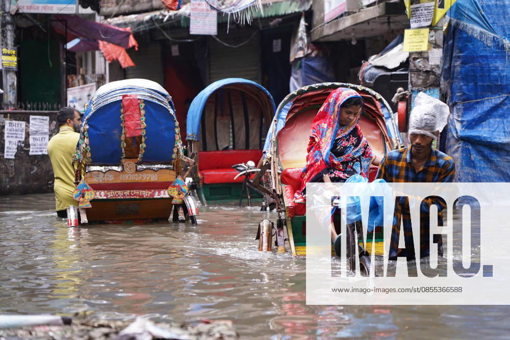 DHAKA, BANGLADESH †May 1, 2026: After several hours of continuous rainfall, many small and major roads across the capital Dhaka were submerged, with water levels ranging from knee-deep to waist-deep in some areas. People forced to leave their homes for work faced severe difficulties, disrupting normal city life. Stray dogs and other animals were also left vulnerable in the flooded conditions. In many cases, clogged manholes filled with plastic waste and debris obstructed drainage systems, leading to widespread waterlogging. Dhaka Bangladesh - ZUMAk185 20260501_zip_k185_003