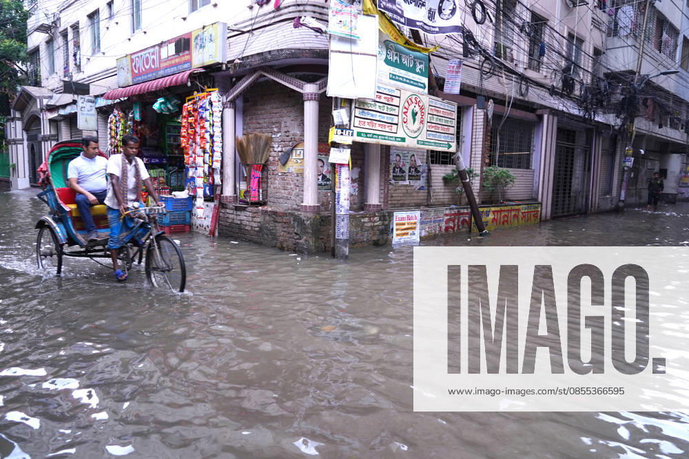 DHAKA, BANGLADESH †May 1, 2026: After several hours of continuous rainfall, many small and major roads across the capital Dhaka were submerged, with water levels ranging from knee-deep to waist-deep in some areas. People forced to leave their homes for work faced severe difficulties, disrupting normal city life. Stray dogs and other animals were also left vulnerable in the flooded conditions. In many cases, clogged manholes filled with plastic waste and debris obstructed drainage systems, leading to widespread waterlogging. Dhaka Bangladesh - ZUMAk185 20260501_zip_k185_042