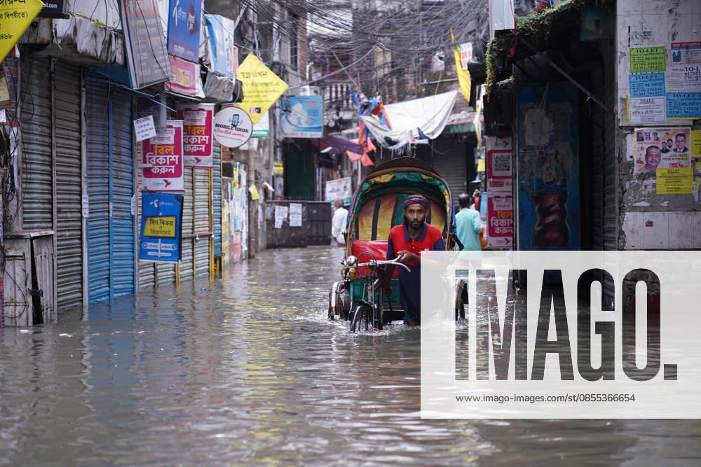 DHAKA, BANGLADESH †May 1, 2026: After several hours of continuous rainfall, many small and major roads across the capital Dhaka were submerged, with water levels ranging from knee-deep to waist-deep in some areas. People forced to leave their homes for work faced severe difficulties, disrupting normal city life. Stray dogs and other animals were also left vulnerable in the flooded conditions. In many cases, clogged manholes filled with plastic waste and debris obstructed drainage systems, leading to widespread waterlogging. Dhaka Bangladesh - ZUMAk185 20260501_zip_k185_002