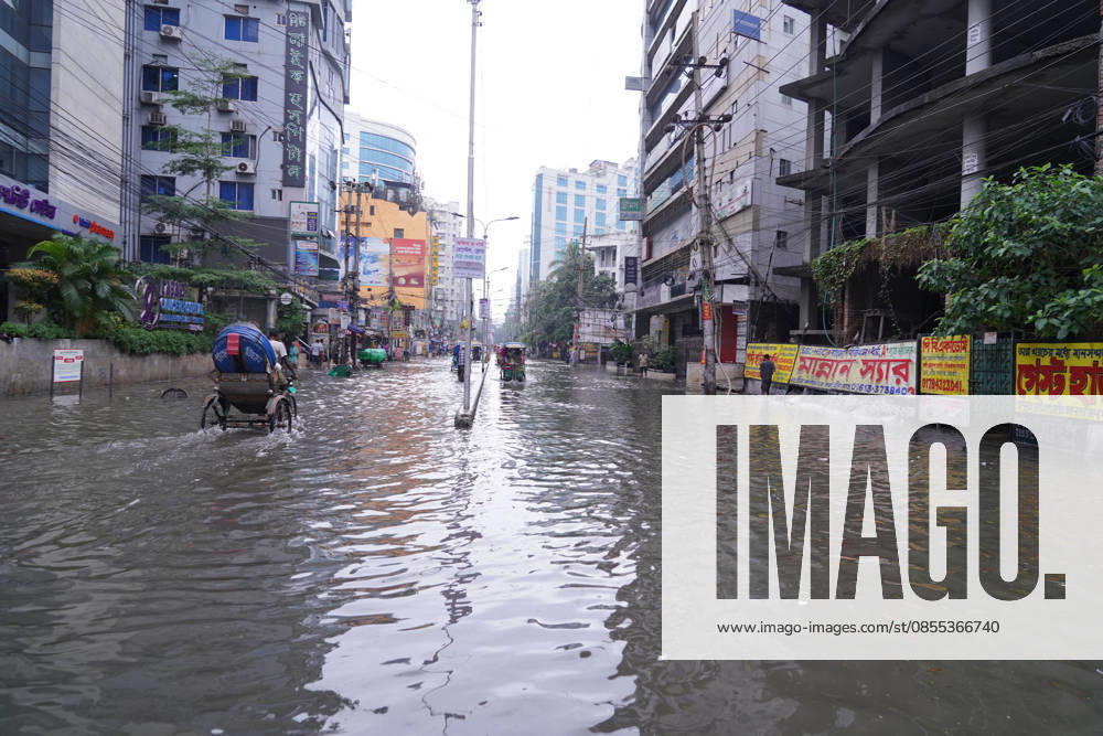 DHAKA, BANGLADESH †May 1, 2026: After several hours of continuous rainfall, many small and major roads across the capital Dhaka were submerged, with water levels ranging from knee-deep to waist-deep in some areas. People forced to leave their homes for work faced severe difficulties, disrupting normal city life. Stray dogs and other animals were also left vulnerable in the flooded conditions. In many cases, clogged manholes filled with plastic waste and debris obstructed drainage systems, leading to widespread waterlogging. Dhaka Bangladesh - ZUMAk185 20260501_zip_k185_035