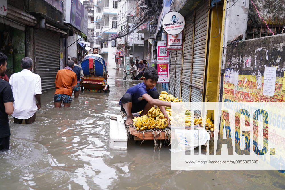 DHAKA, BANGLADESH Ã¢â‚¬ May 1, 2026: After several hours of continuous rainfall, many small and major roads across the capital Dhaka were submerged, with water levels ranging from knee-deep to waist-deep in some areas. People forced to leave their homes for work faced severe difficulties, disrupting normal city life. Stray dogs and other animals were also left vulnerable in the flooded conditions. In many cases, clogged manholes filled with plastic waste and debris obstructed drainage systems, leading to widespread waterlogging. Dhaka Bangladesh - ZUMAk185 20260501_zip_k185_021