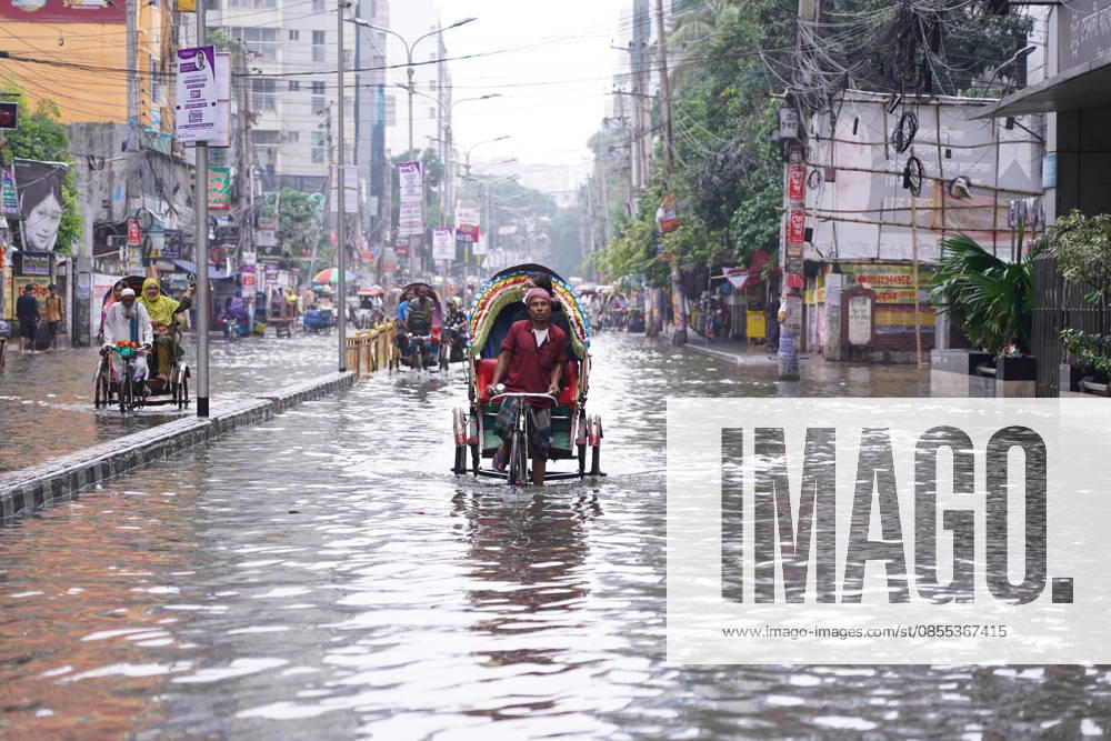 DHAKA, BANGLADESH †May 1, 2026: After several hours of continuous rainfall, many small and major roads across the capital Dhaka were submerged, with water levels ranging from knee-deep to waist-deep in some areas. People forced to leave their homes for work faced severe difficulties, disrupting normal city life. Stray dogs and other animals were also left vulnerable in the flooded conditions. In many cases, clogged manholes filled with plastic waste and debris obstructed drainage systems, leading to widespread waterlogging. Dhaka Bangladesh - ZUMAk185 20260501_zip_k185_041