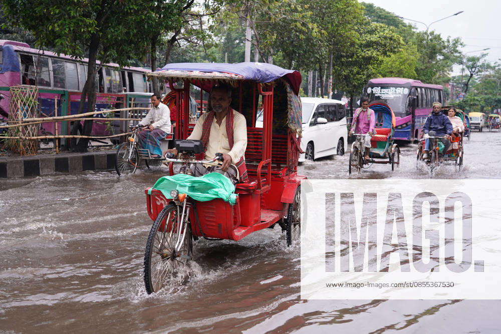 DHAKA, BANGLADESH †May 1, 2026: After several hours of continuous rainfall, many small and major roads across the capital Dhaka were submerged, with water levels ranging from knee-deep to waist-deep in some areas. People forced to leave their homes for work faced severe difficulties, disrupting normal city life. Stray dogs and other animals were also left vulnerable in the flooded conditions. In many cases, clogged manholes filled with plastic waste and debris obstructed drainage systems, leading to widespread waterlogging. Dhaka Bangladesh - ZUMAk185 20260501_zip_k185_037