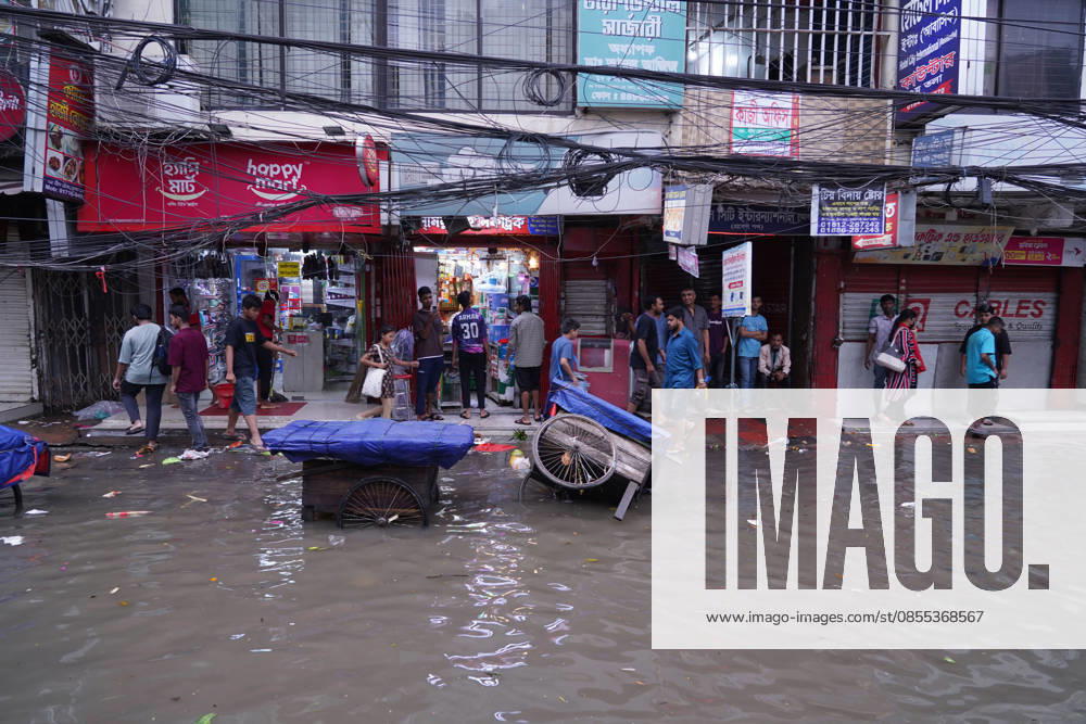DHAKA, BANGLADESH †May 1, 2026: After several hours of continuous rainfall, many small and major roads across the capital Dhaka were submerged, with water levels ranging from knee-deep to waist-deep in some areas. People forced to leave their homes for work faced severe difficulties, disrupting normal city life. Stray dogs and other animals were also left vulnerable in the flooded conditions. In many cases, clogged manholes filled with plastic waste and debris obstructed drainage systems, leading to widespread waterlogging. Dhaka Bangladesh - ZUMAk185 20260501_zip_k185_027