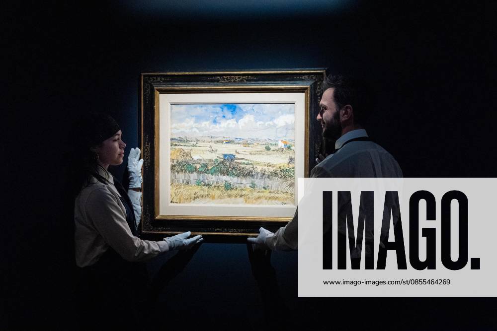 Auction assistants pose with Vincent Van Gogh La Moisson en Provence during May Marquee Modern & Contemporary Auctions press preview at Sotheby s The Breuer in New York, NY on May 1, 2026. Bronx USA - ZUMAr339 20260501_znp_r339_032