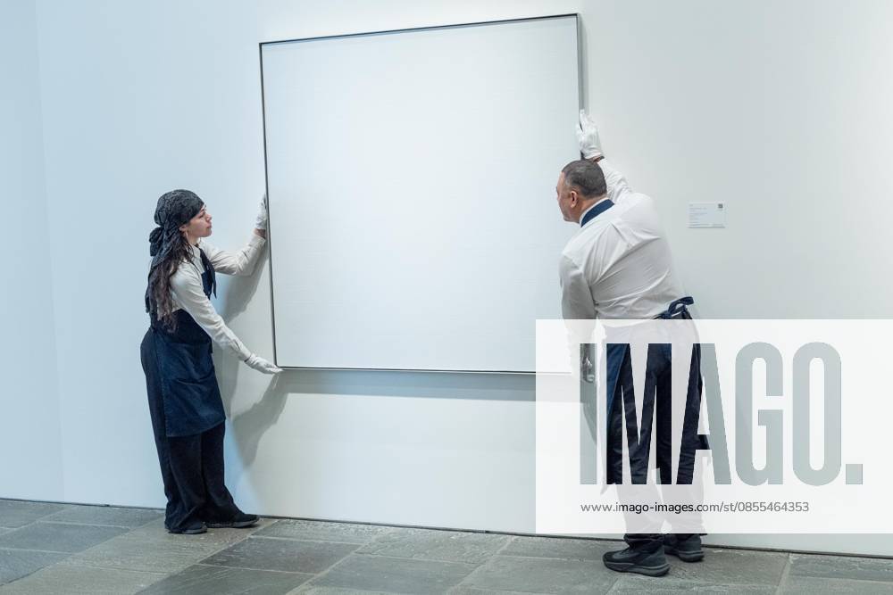 Auction assistants pose with Agnes Martin s Untitled 10 during May Marquee Modern & Contemporary Auctions press preview at Sotheby s The Breuer in New York, NY on May 1, 2026. Bronx USA - ZUMAr339 20260501_znp_r339_024