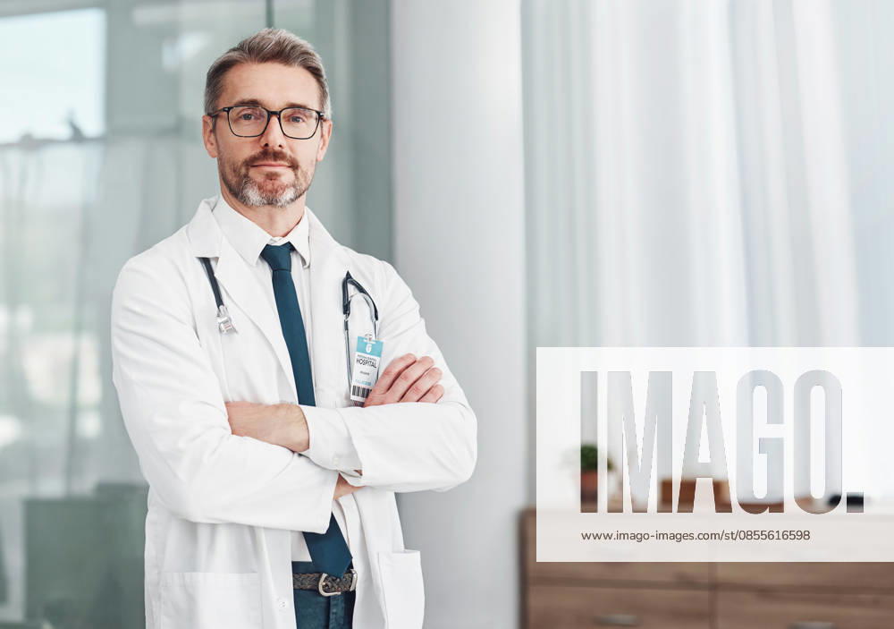 Healthcare, leadership and portrait of doctor, man in hospital for support, success and help in medical work. Health, wellness and medicine, confident mature professional with stethoscope and mockup (License=RF) ,model released, Symbolfoto