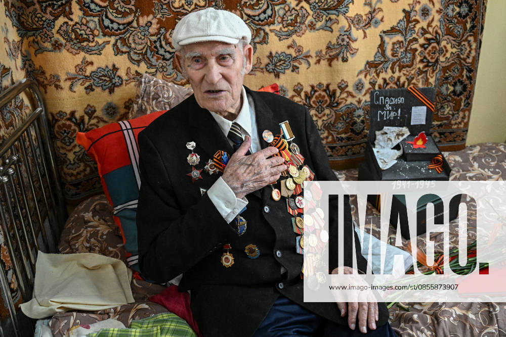 Russia WWII Veterans 9159126 07.05.2026 World War II veteran Ivan Olenin, 101, receives congratulations ahead of Victory Day, marking the 81st anniversary of the victory over Nazi Germany in World War Two, in Lugansk, Lugansk People s Republic, Russia. Ivan Fyodorovich was conscripted into the Red Army in October 1943. He served as a squad commander in the 112th Separate Reconnaissance Artillery Battalion. Olenin took part in the liberation of Poland and the assault on Berlin. He was awarded the Order of the Patriotic War, 2nd Class, and the Order of the Red Star, as well as the medals For Combat Merit, For the Liberation of Warsaw, For the Capture of Berlin, and For the Victory over Germany in the Great Patriotic War 1941 1945. Sergey Bo