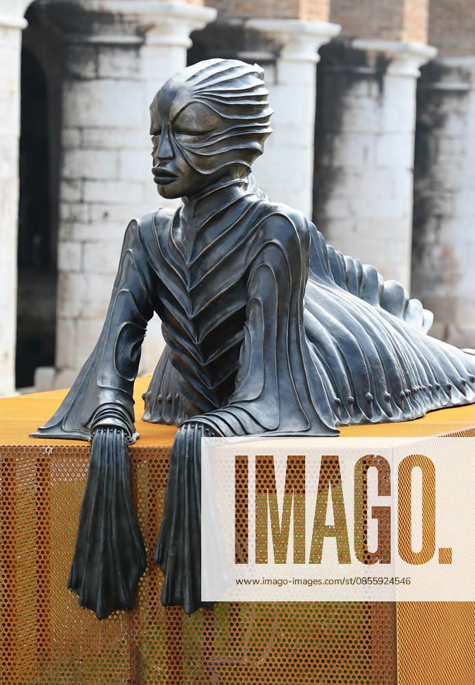 The 61st International Art Exhibition of the Venice Biennale - In Minor Keys by Koyo Kouoh - will take place from Saturday, May 9th to Sunday, November 22nd, 2026 (pre-opening May 6th, 7th, and 8th) in the institutional venues of the Giardini, the Arsenale, and various venues throughout Venice. Pictured: Wangechi Mutu s bronze sculpture SimbiSiren.