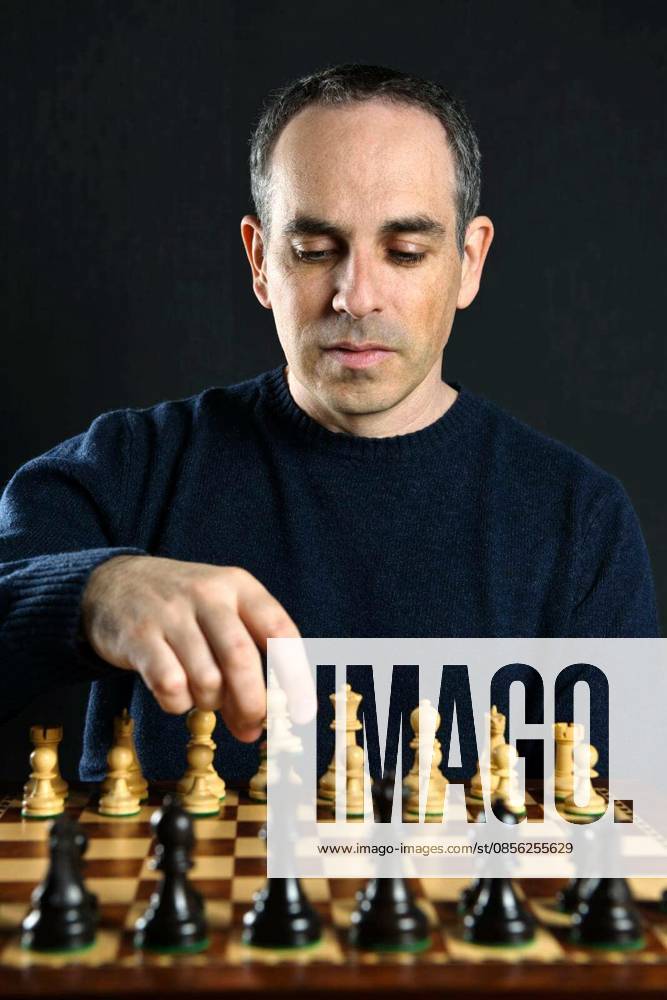 Man playing chess model released Symbolfoto