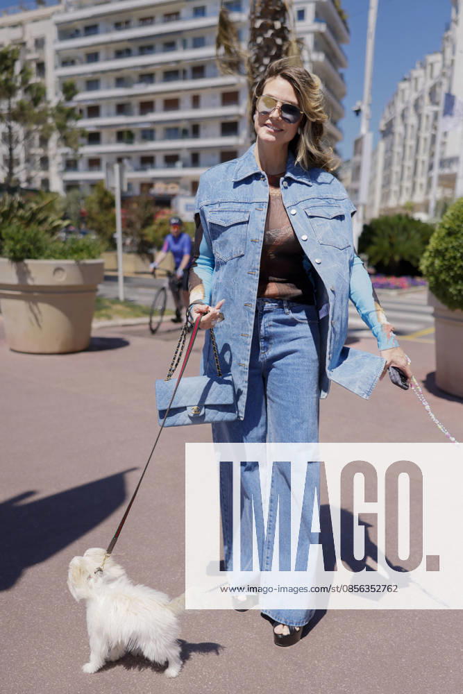 Cannes Heidi Klum Exits Martinez MP Cannes, France- May 12: Heidi Klum arrives to Hotel Martinez beach restaurant during 79th Festival of Cannes, on May 12, 2026 in Cannes, France. Photo by Marco Piovanotto ABACAPRESS:COM Cannes France
