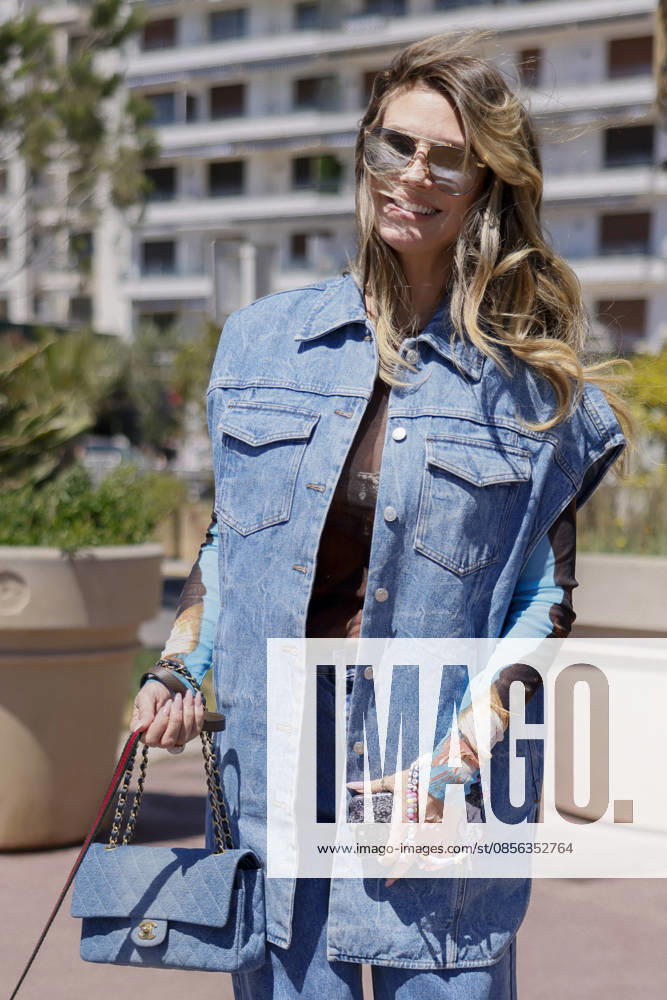Cannes Heidi Klum Exits Martinez MP Cannes, France- May 12: Heidi Klum arrives to Hotel Martinez beach restaurant during 79th Festival of Cannes, on May 12, 2026 in Cannes, France. Photo by Marco Piovanotto ABACAPRESS:COM Cannes France