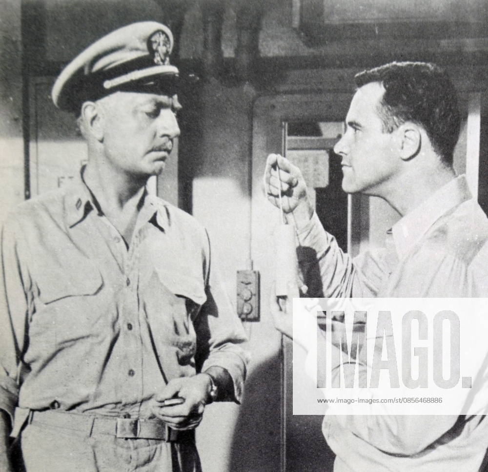 Film still from Mister Roberts Film still from Mister Roberts starring Jack Lemmon (1925-2001) and William Powell (1892-1984). Dated 20th Century Editorial use only. All other uses to be cleared with the copyright owner (World History Archive), in advance., WHA_086_0933.jpg, Film still; Mister Roberts; Jack Lemmon; William Powell; 20th Century; black and white; actors; Hollywood; classic film; vintage; movie scene; military; navy; comedy; drama; iconic; famous actors; American cinema; 1950s; World War II; sailors; ship; war film; entertainment; cinematic; on-screen chemistry; talented actors; Hollywood legends; film industry; character actors.