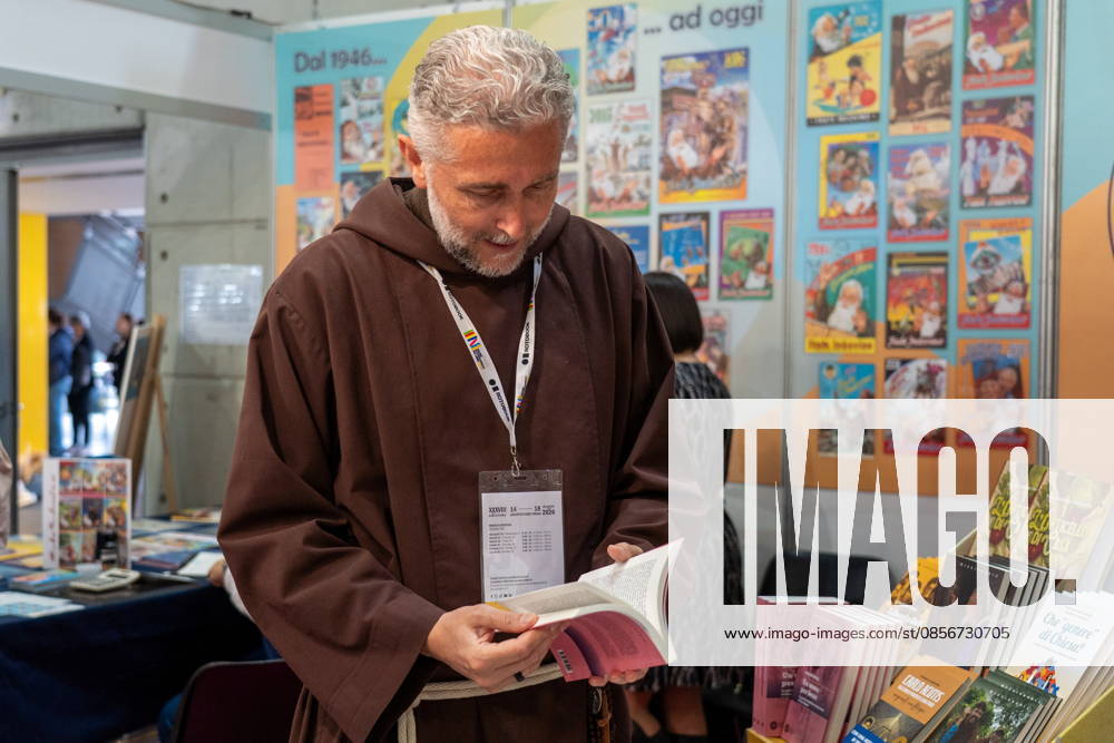Some moments from the second day of the International Book Fair. Pictured is a priest reading a book. Turin, May 15, 2026 Turin Italy - ZUMAa289 20260515_zia_a289_019