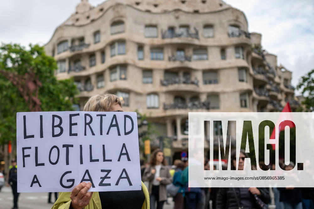 Pro-Palestinian protesters march in Barcelona after Freedom Flotilla interception BARCELONA , SPAIN - MAY 18: Hundreds of pro-Palestinian demonstrators march through central Barcelona following Israel’s interception of the Freedom Flotilla in international waters earlier in the day, in Barcelona, Spain on May 18, 2026. Organisers said around 500 people joined the rally, which started outside the European Union representation office and ended at the Spanish government delegation headquarters. Protesters carried Palestinian flags and banners demanding an end to the war in Gaza and condemning European support for Israel. Speakers at the demonstration accused Western governments of enabling Israeli actions and denounced what they described as g
