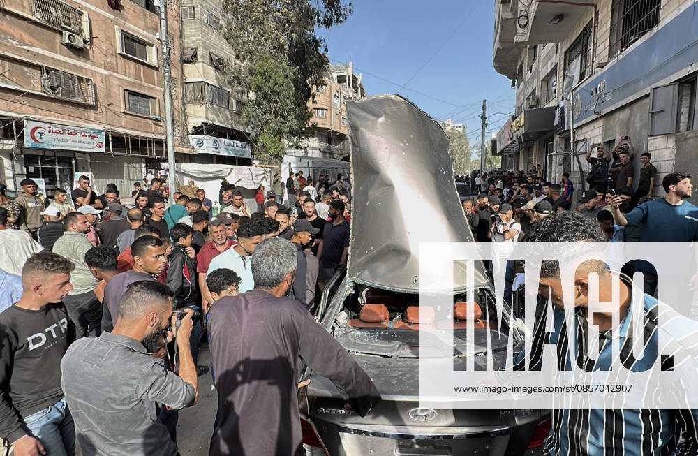 Palestinians Gather at Site of Israeli Strike in Gaza City Palestinians gather at the site of an Israeli airstrike that targeted a vehicle on al-Shuhada Street in Gaza City, on May 19, 2026. According to local sources, the strike killed one person and wounded several others. Photo by Omar Ashtawy apaimages Gaza city Gaza Strip Palestinian Territory 190526_Gaza_OSH_00(10)