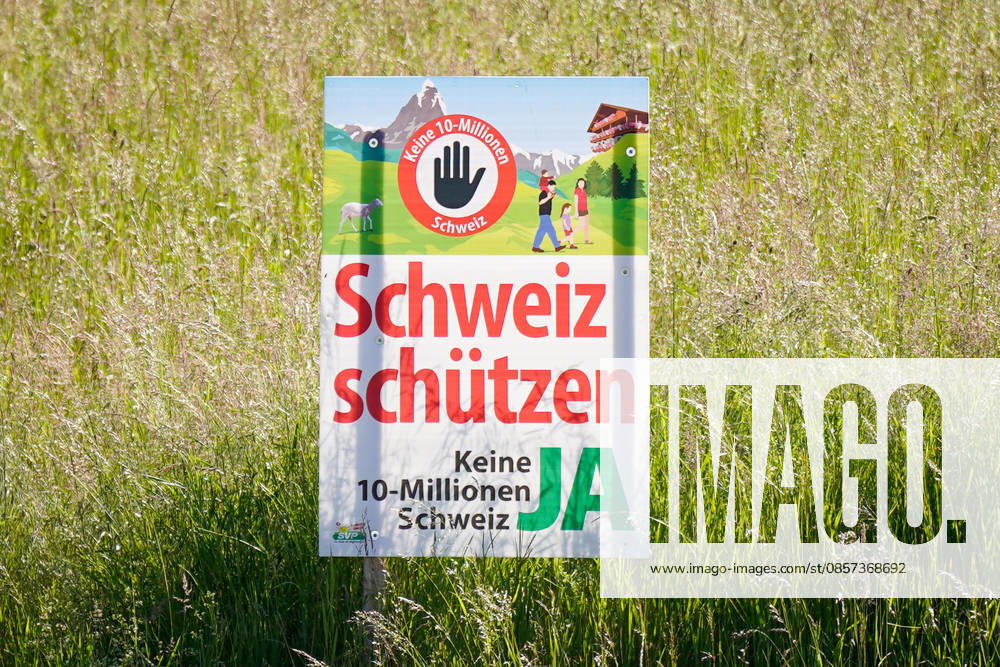 Switzerland, Europe Political poster of the Swiss Peoples Party SVP against population growth and immigration with the slogan Protect Switzerland No 10 million Switzerland YES Political campaign, referendum, Swiss