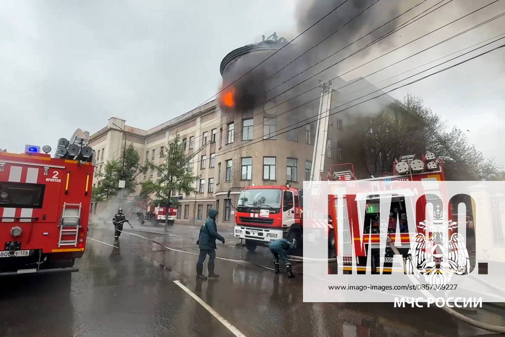 RUSSIA, IRKUTSK - MAY 23, 2026: Firefighters battle a fire at Research Institute of Precious and Rare Metals and Diamonds. Video grab. Best quality available. Russia Emergencies Ministry TASS 92905743