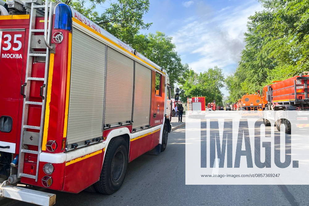 RUSSIA, MOSCOW - MAY 23, 2026: A fire truck is pictured outside a warehouse in south-eastern Moscow hit by fire. Sergei Shakhidzhanyan TASS 92905826