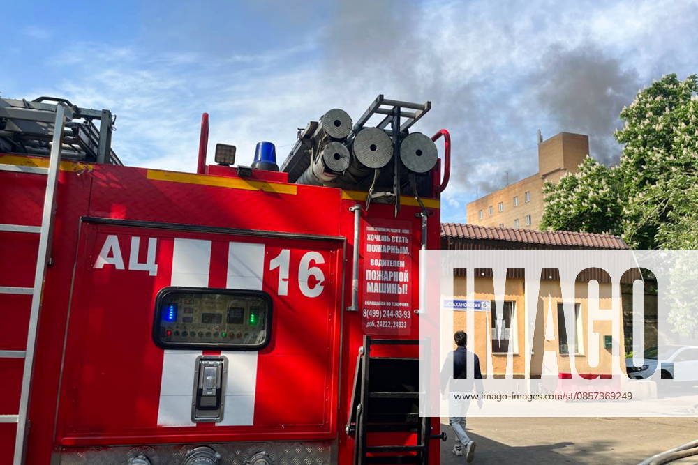 RUSSIA, MOSCOW - MAY 23, 2026: A fire truck is pictured outside a warehouse in south-eastern Moscow hit by fire. Sergei Shakhidzhanyan TASS 92905827