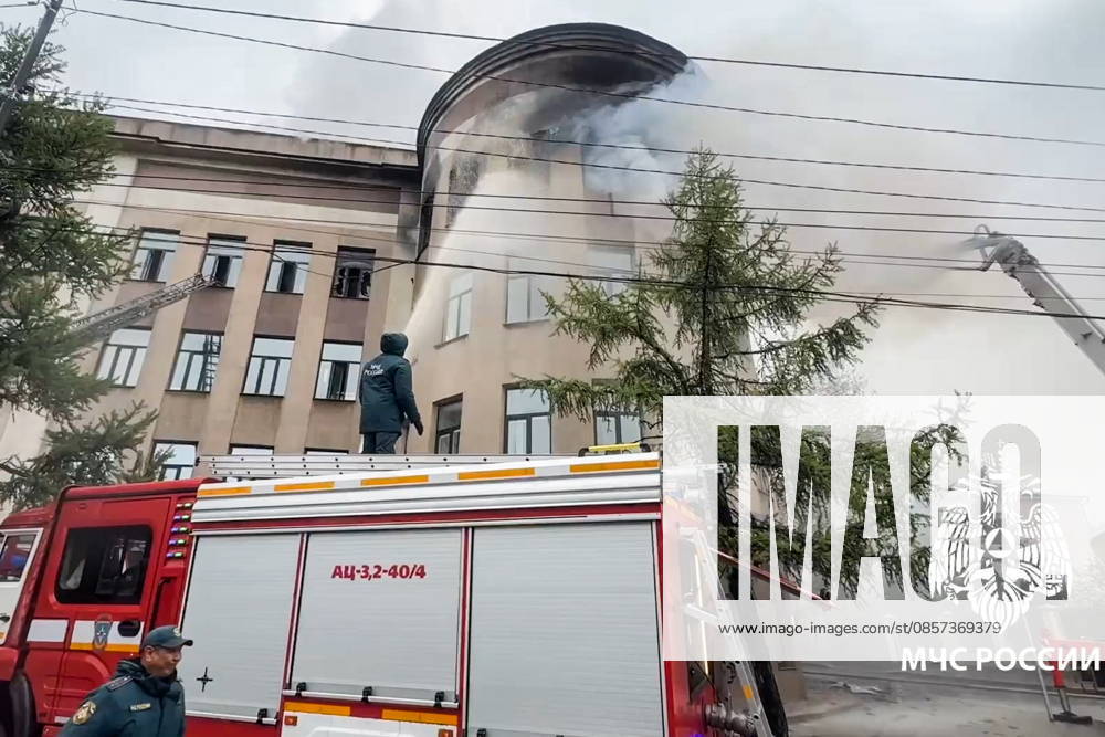 RUSSIA, IRKUTSK - MAY 23, 2026: Firefighters battle a fire at Research Institute of Precious and Rare Metals and Diamonds. Video grab. Best quality available. Russia Emergencies Ministry TASS 92905867