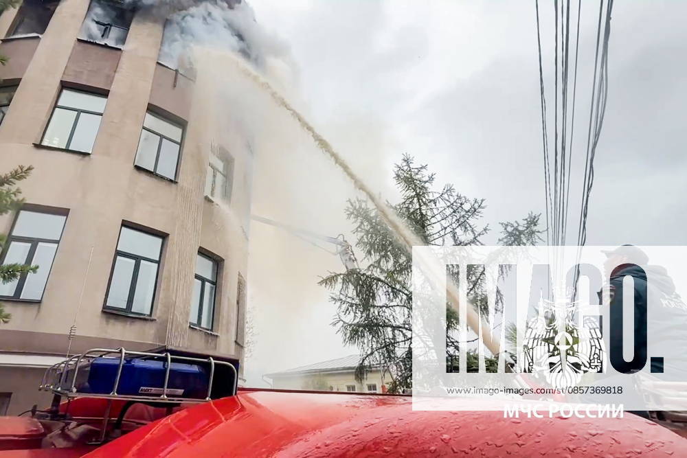 RUSSIA, IRKUTSK - MAY 23, 2026: A firefighter battles a fire at Research Institute of Precious and Rare Metals and Diamonds. Video grab. Best quality available Irkutsk Russia - ZUMAt113 20260523_zaa_t113_014