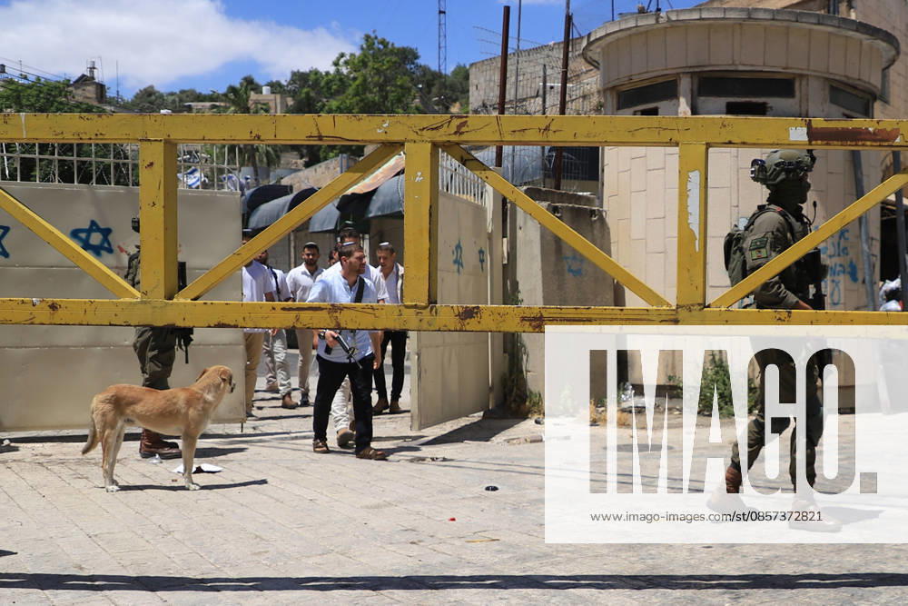 Israeli forces block entrances with iron barriers during settler raid in Hebron HEBRON, PALESTINE - MAY 23: Israeli settlers, under the protection of Israeli forces, raid the Old City area of Hebron in the southern West Bank, Palestine, on May 23, 2026. Blocking entrances and exits with iron barriers during the raid, Israeli forces restricted the movement of Palestinians. Amer Shallodi Anadolu Hebron West Bank. Editorial use only. Please get in touch for any other usage.