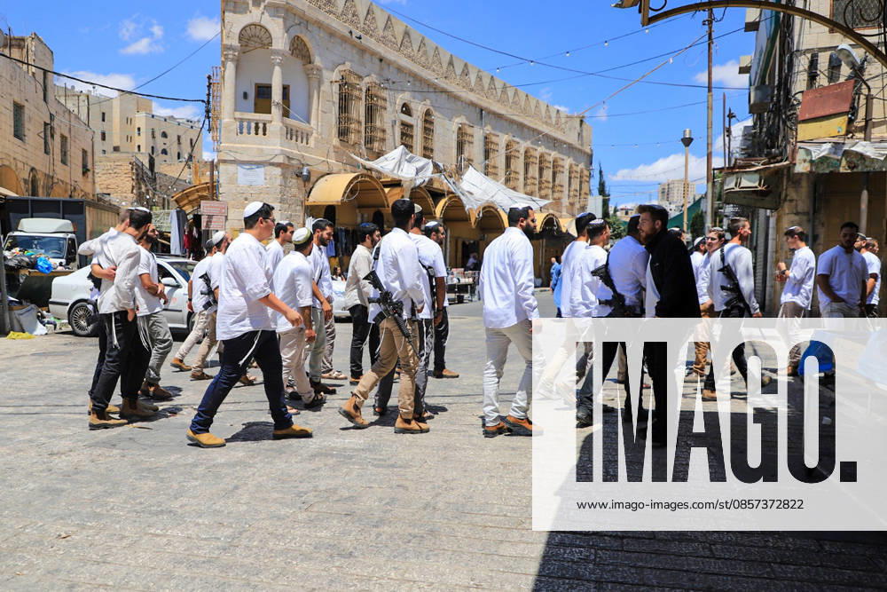 Israeli forces block entrances with iron barriers during settler raid in Hebron HEBRON, PALESTINE - MAY 23: Israeli settlers, under the protection of Israeli forces, raid the Old City area of Hebron in the southern West Bank, Palestine, on May 23, 2026. Blocking entrances and exits with iron barriers during the raid, Israeli forces restricted the movement of Palestinians. Amer Shallodi Anadolu Hebron West Bank. Editorial use only. Please get in touch for any other usage.
