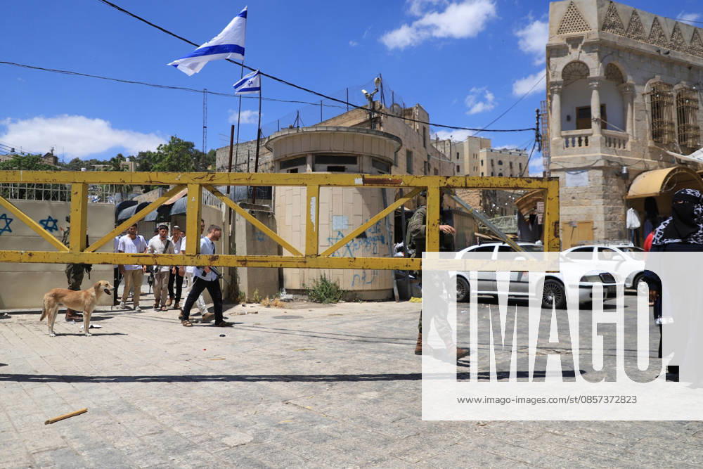 Israeli forces block entrances with iron barriers during settler raid in Hebron HEBRON, PALESTINE - MAY 23: Israeli settlers, under the protection of Israeli forces, raid the Old City area of Hebron in the southern West Bank, Palestine, on May 23, 2026. Blocking entrances and exits with iron barriers during the raid, Israeli forces restricted the movement of Palestinians. Amer Shallodi Anadolu Hebron West Bank. Editorial use only. Please get in touch for any other usage.