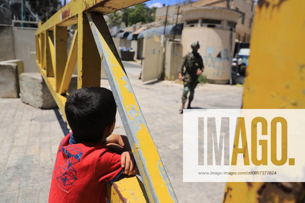 Israeli forces block entrances with iron barriers during settler raid in Hebron HEBRON, PALESTINE - MAY 23: Israeli settlers, under the protection of Israeli forces, raid the Old City area of Hebron in the southern West Bank, Palestine, on May 23, 2026. Blocking entrances and exits with iron barriers during the raid, Israeli forces restricted the movement of Palestinians. Amer Shallodi Anadolu Hebron West Bank. Editorial use only. Please get in touch for any other usage.