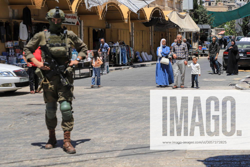 Israeli forces block entrances with iron barriers during settler raid in Hebron HEBRON, PALESTINE - MAY 23: Israeli settlers, under the protection of Israeli forces, raid the Old City area of Hebron in the southern West Bank, Palestine, on May 23, 2026. Blocking entrances and exits with iron barriers during the raid, Israeli forces restricted the movement of Palestinians. Amer Shallodi Anadolu Hebron West Bank. Editorial use only. Please get in touch for any other usage.
