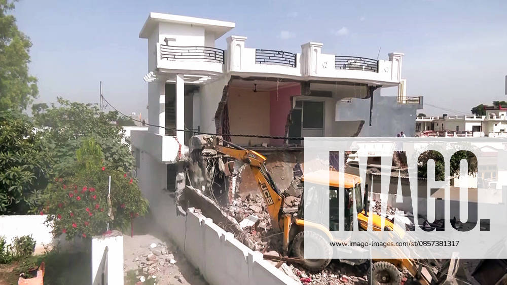 District administration demolishes illegal structures & hideouts of drug smugglers under Nasha Mukt Abhiyaan in Jammu Jammu Jammu & Kashmir , May 23 (ANI): The district administration conducts a demolition drive of illegal structure(s) allegedly linked to a drug smuggler under the Nasha Mukt Abhiyaan campaign at Miran Sahib, in Jammu on Saturday. (ANI Video Grab) Jammu Jammu & Kashmir India
