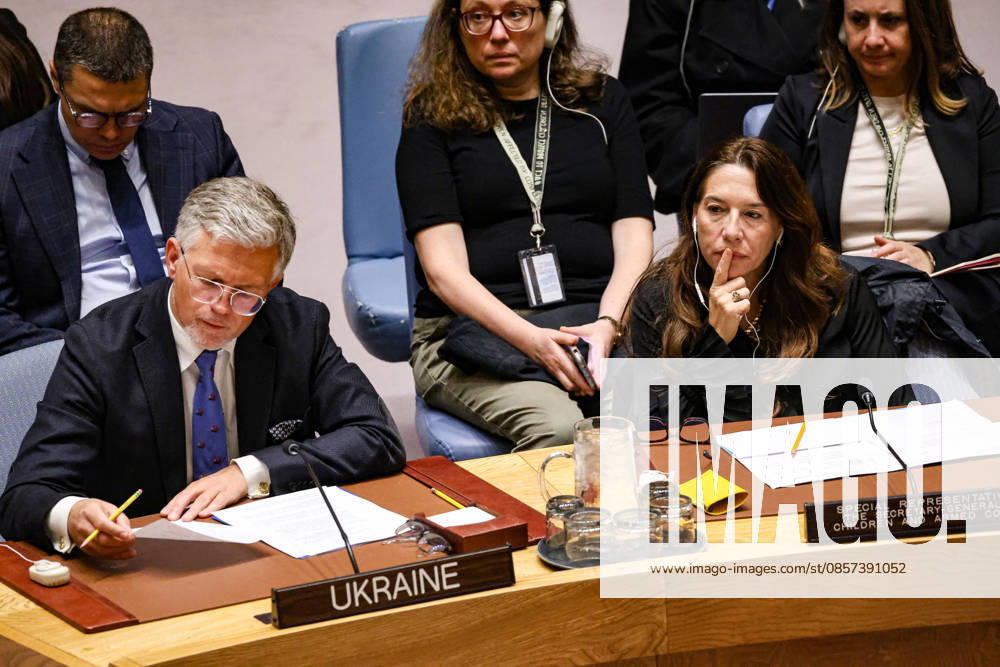 (L to R) ANDRII MELNYK, Permanent Representative of Ukraine to the UN looks over notes as VANESSA FRAZIER, Special Representative of the Secretary-General for Children and Armed Conflict, sits next to him during an emergency UN Security Council meeting on Ukraine at UNHQ following Russian allegations of a Ukrainian drone strike on a vocational school and student dormitory in Russian-controlled Luhansk, which Ukraine denies targeted civilians. New York USA - ZUMAo116 20260523_znp_o116_014