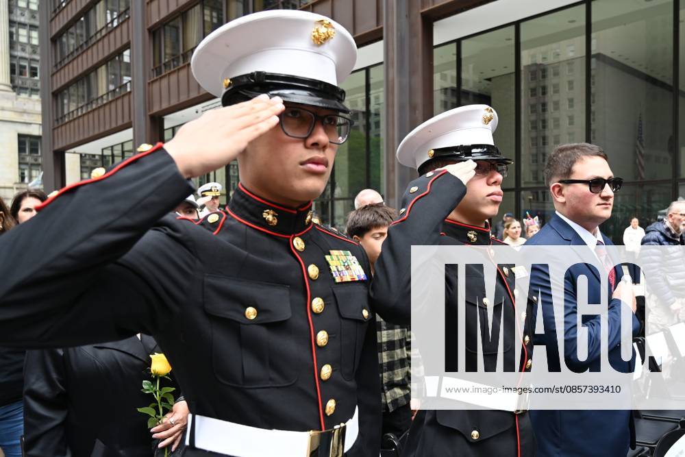 Chicago Memorial Day Parade CHICAGO, ILLINOIS - MAY 23: The Chicago Memorial Day Parade proceeds through the city center, with participants carrying American flags and marching in formation on Saturday, May 23, 2026. The event, held each year before Memorial Day, pays solemn tribute to the men and women of the U.S. Armed Forces who made the ultimate sacrifice. Jacek Boczarski Anadolu Illinois United States. Editorial use only. Please get in touch for any other usage.