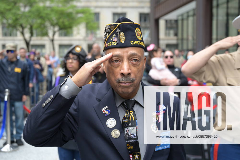 Chicago Memorial Day Parade CHICAGO, ILLINOIS - MAY 23: The Chicago Memorial Day Parade proceeds through the city center, with participants carrying American flags and marching in formation on Saturday, May 23, 2026. The event, held each year before Memorial Day, pays solemn tribute to the men and women of the U.S. Armed Forces who made the ultimate sacrifice. Jacek Boczarski Anadolu Illinois United States. Editorial use only. Please get in touch for any other usage.