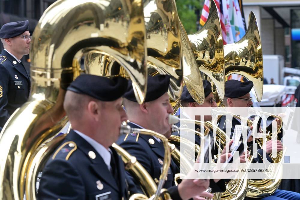 Chicago Memorial Day Parade CHICAGO, ILLINOIS - MAY 23: The Chicago Memorial Day Parade proceeds through the city center, with participants carrying American flags and marching in formation on Saturday, May 23, 2026. The event, held each year before Memorial Day, pays solemn tribute to the men and women of the U.S. Armed Forces who made the ultimate sacrifice. Jacek Boczarski Anadolu Illinois United States. Editorial use only. Please get in touch for any other usage.