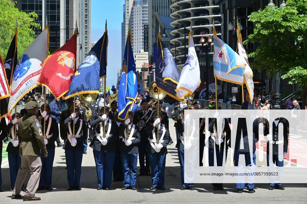Chicago Memorial Day Parade CHICAGO, ILLINOIS - MAY 23: The Chicago Memorial Day Parade proceeds through the city center, with participants carrying American flags and marching in formation on Saturday, May 23, 2026. The event, held each year before Memorial Day, pays solemn tribute to the men and women of the U.S. Armed Forces who made the ultimate sacrifice. Jacek Boczarski Anadolu Illinois United States. Editorial use only. Please get in touch for any other usage.