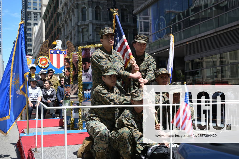 Chicago Memorial Day Parade CHICAGO, ILLINOIS - MAY 23: The Chicago Memorial Day Parade proceeds through the city center, with participants carrying American flags and marching in formation on Saturday, May 23, 2026. The event, held each year before Memorial Day, pays solemn tribute to the men and women of the U.S. Armed Forces who made the ultimate sacrifice. Jacek Boczarski Anadolu Illinois United States. Editorial use only. Please get in touch for any other usage.