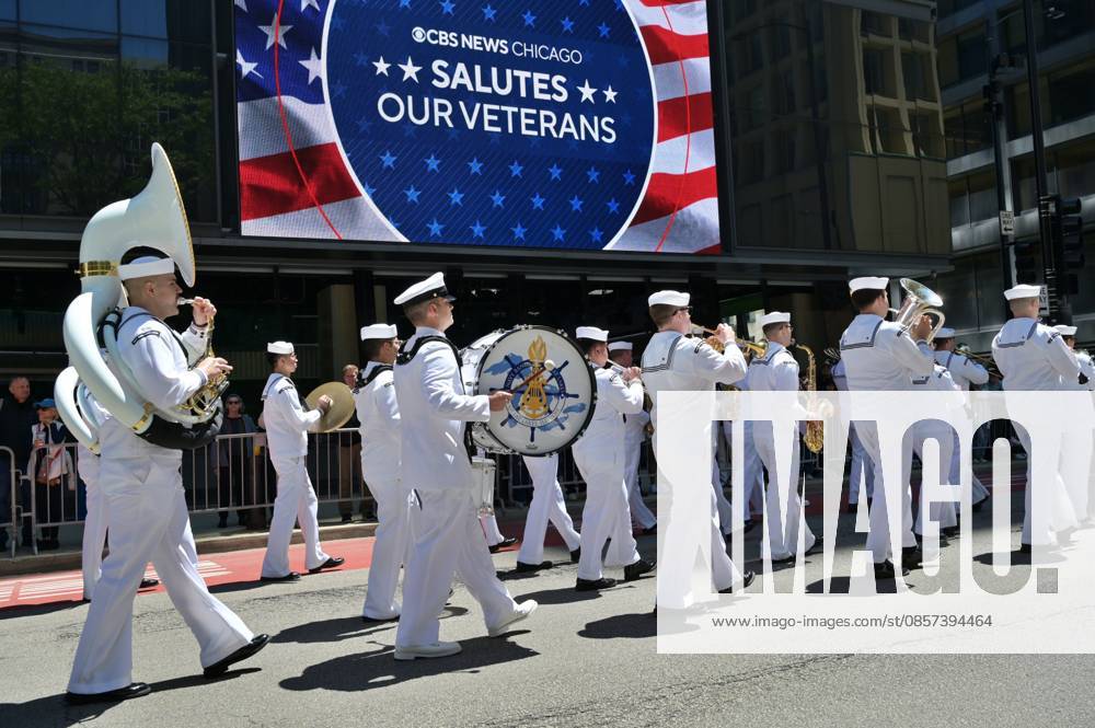 Chicago Memorial Day Parade CHICAGO, ILLINOIS - MAY 23: The Chicago Memorial Day Parade proceeds through the city center, with participants carrying American flags and marching in formation on Saturday, May 23, 2026. The event, held each year before Memorial Day, pays solemn tribute to the men and women of the U.S. Armed Forces who made the ultimate sacrifice. Jacek Boczarski Anadolu Illinois United States. Editorial use only. Please get in touch for any other usage.