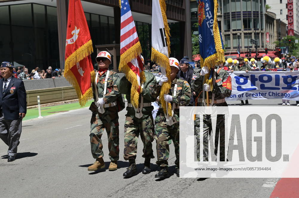 Chicago Memorial Day Parade CHICAGO, ILLINOIS - MAY 23: The Chicago Memorial Day Parade proceeds through the city center, with participants carrying American flags and marching in formation on Saturday, May 23, 2026. The event, held each year before Memorial Day, pays solemn tribute to the men and women of the U.S. Armed Forces who made the ultimate sacrifice. Jacek Boczarski Anadolu Illinois United States. Editorial use only. Please get in touch for any other usage.