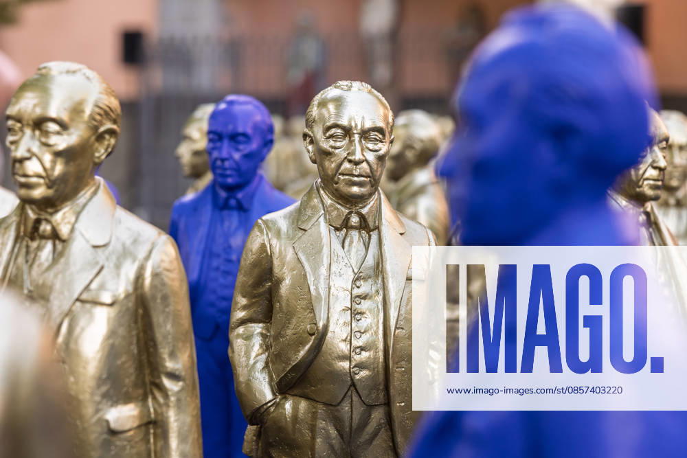 Adenauer art installation in Bad Honnef 23 05 26 Art installation by artist Ottmar Hörl with 200 gold and blue sculptures of the first Federal Chancellor Konrad Adenauer on the church square in Bad Honnef The presentat