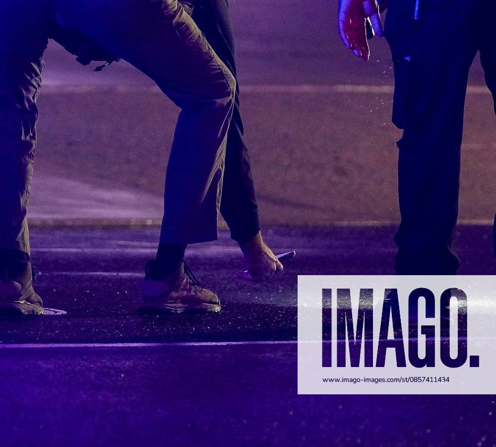 Police investigators collect evidence in the 1700 block of Pennsylvania Avenue, Northwest, which is one block west of the White House in Washington, DC, USA, following the shooting there on Saturday, May 23, 2026. Two people were shot and taken to a local hospital, one has died Washington USA - ZUMAs152 20260523_faa_s152_039